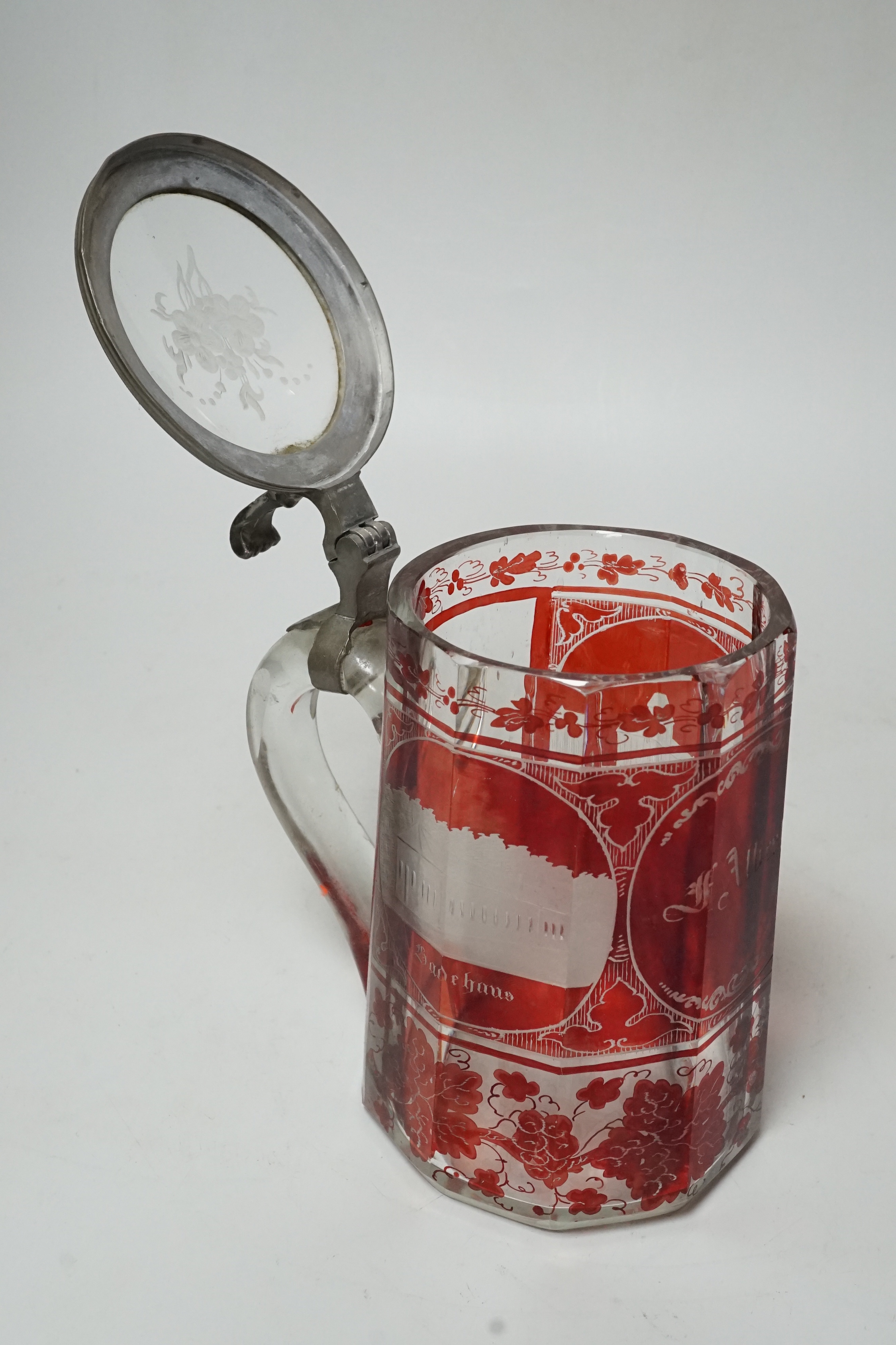 A 19th century Bohemian etched ruby glass pewter mounted tankard